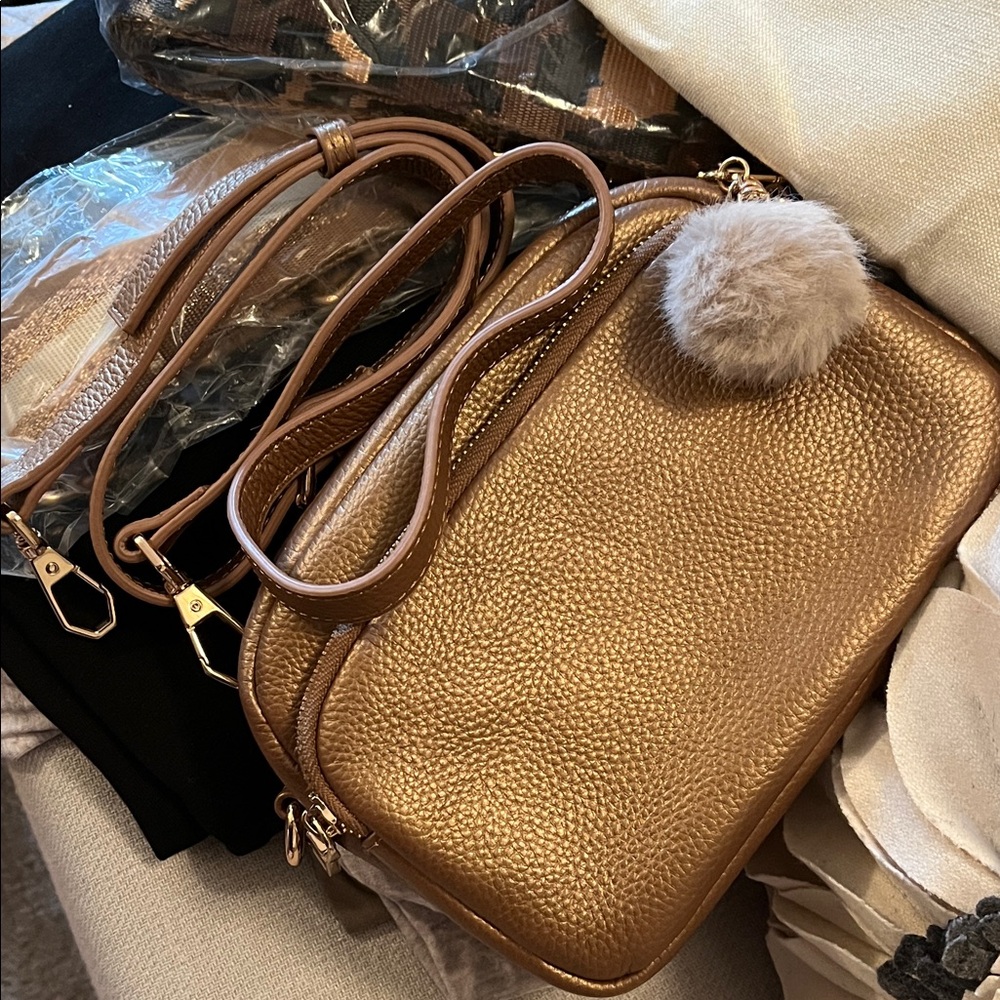Gold Pebbled Crossbody Bag with Pom Pom